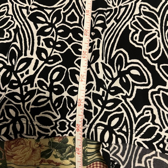 Sleeveless patterned dress with ruffle type top - Picture 12 of 16